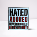 Hated Adored Never Ignored Badge